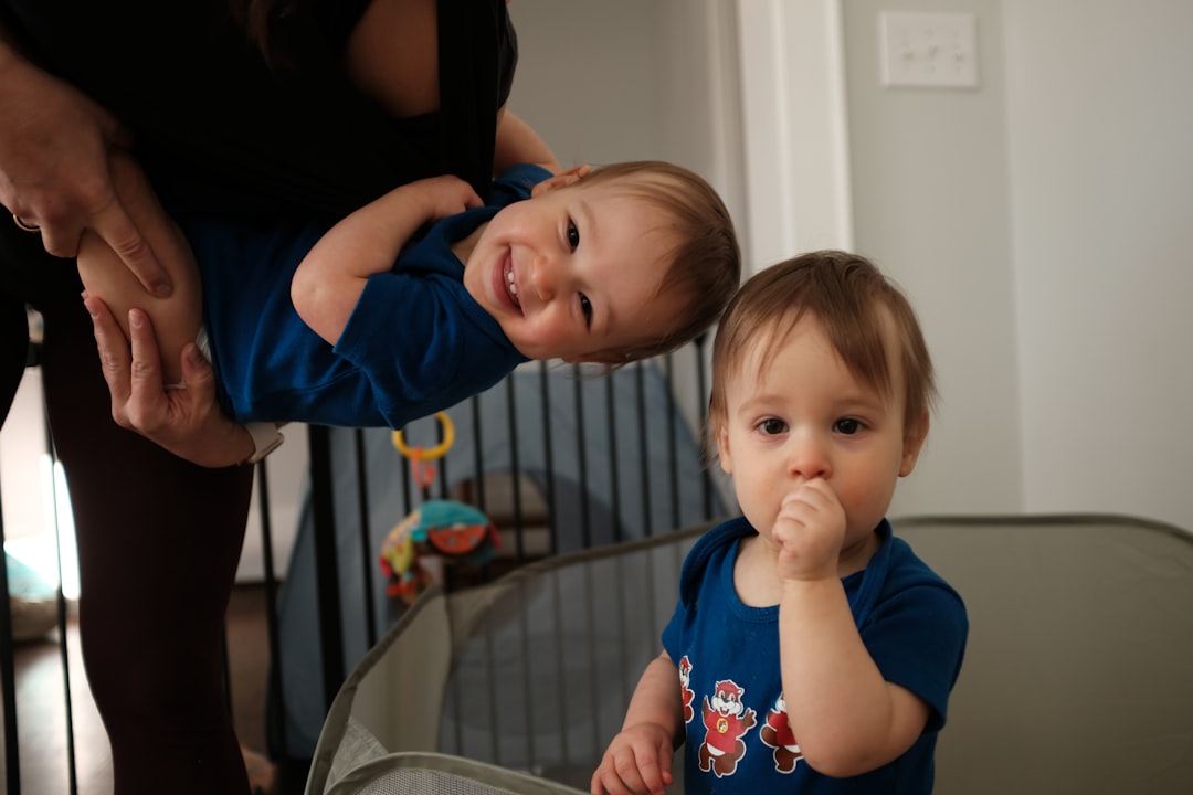 A serene scene of a parent gently caring for a baby, showcasing a safe and comfortable environment with baby care essentials.